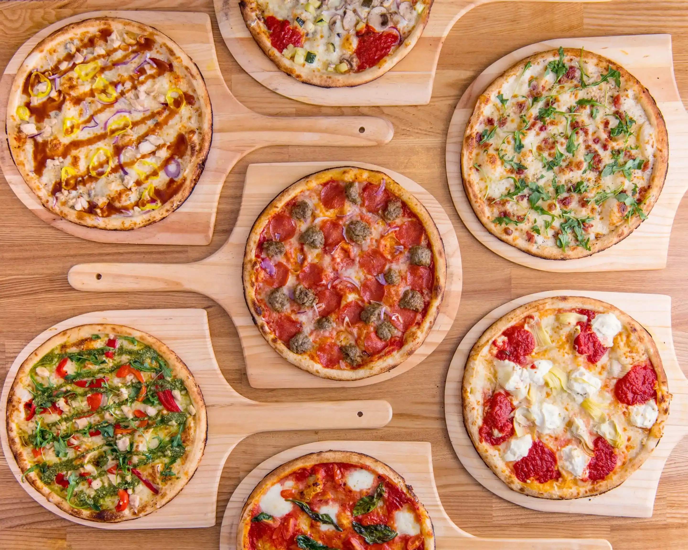 Assorted Coco Brooks pizzas ready to share